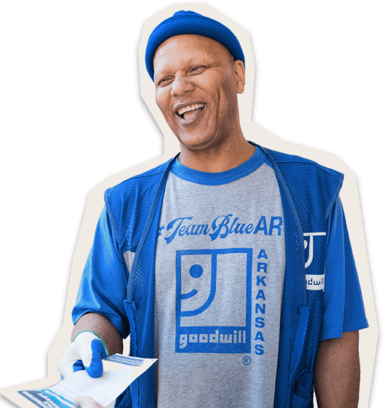 Smiling employee handing customer a paper