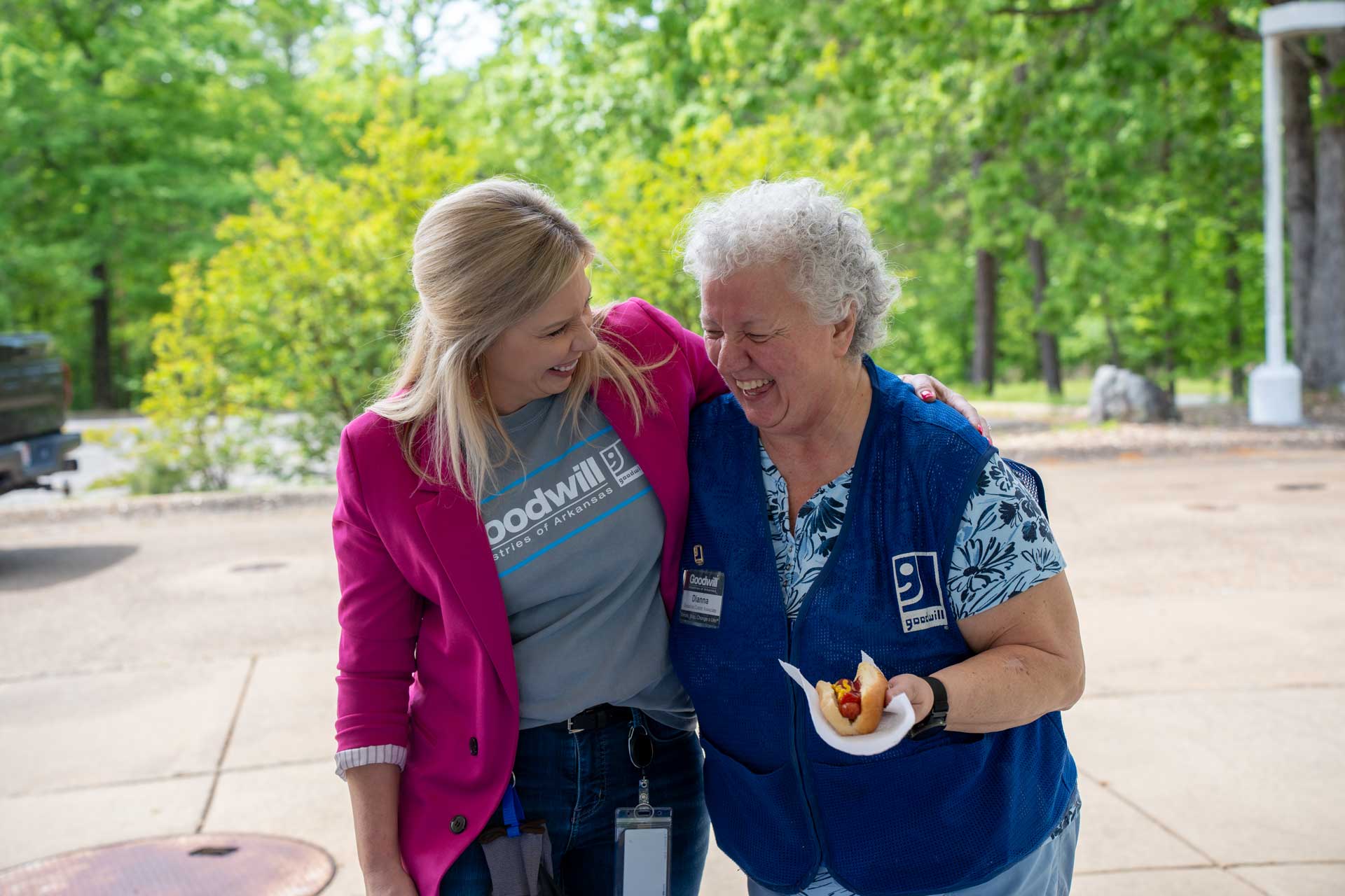 Laughing volunteers at a cookout